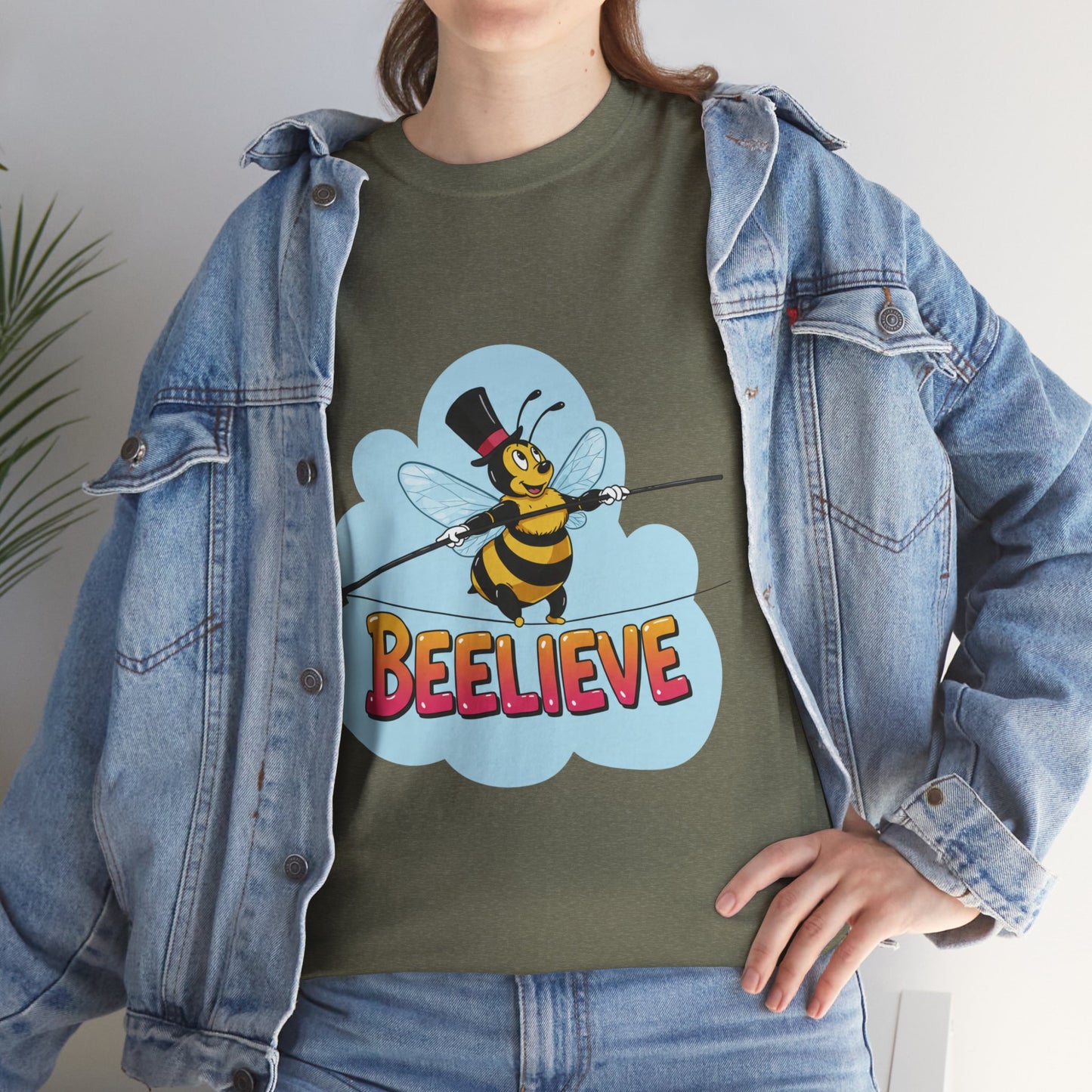 “Beelieve” Bee Pun T‑Shirt | Cute Bee Graphic Tee | Inspirational Pun Shirt | Funny Nature Lover Gift | Bee Belief Positive Vibes Tee
