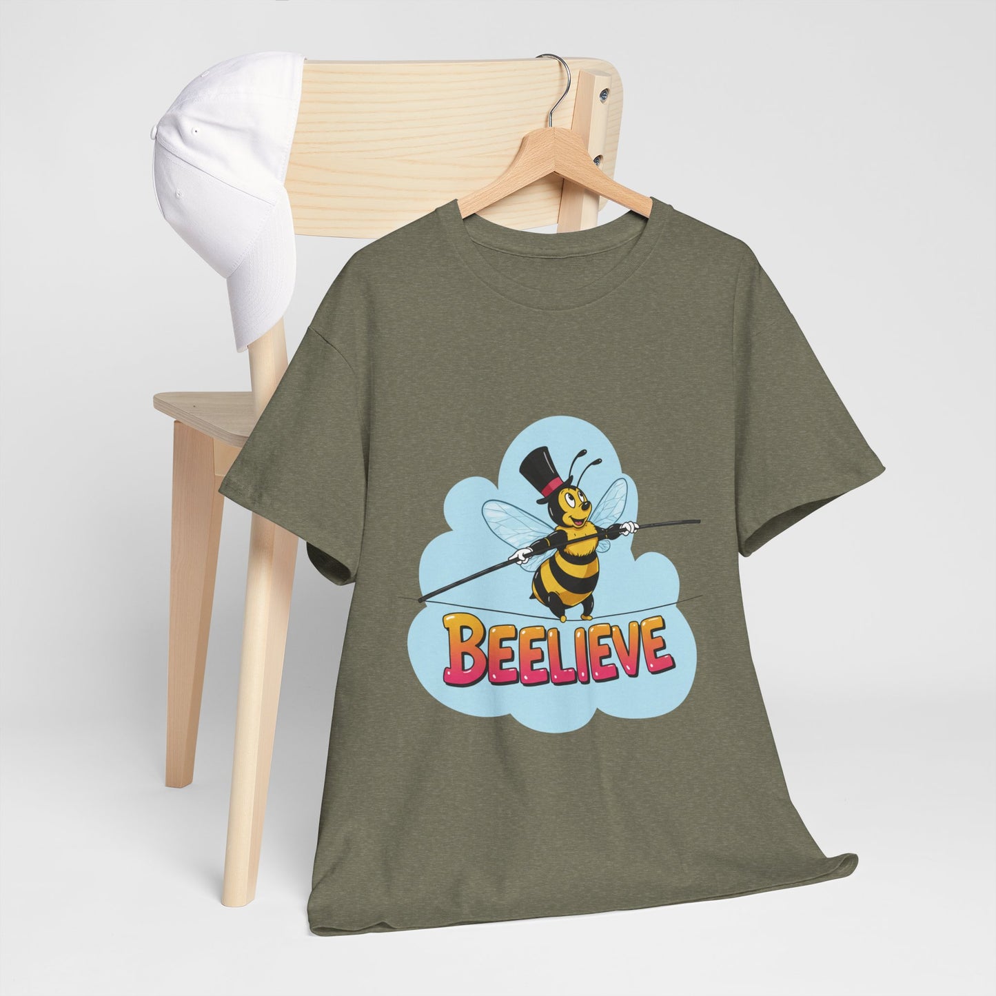 “Beelieve” Bee Pun T‑Shirt | Cute Bee Graphic Tee | Inspirational Pun Shirt | Funny Nature Lover Gift | Bee Belief Positive Vibes Tee
