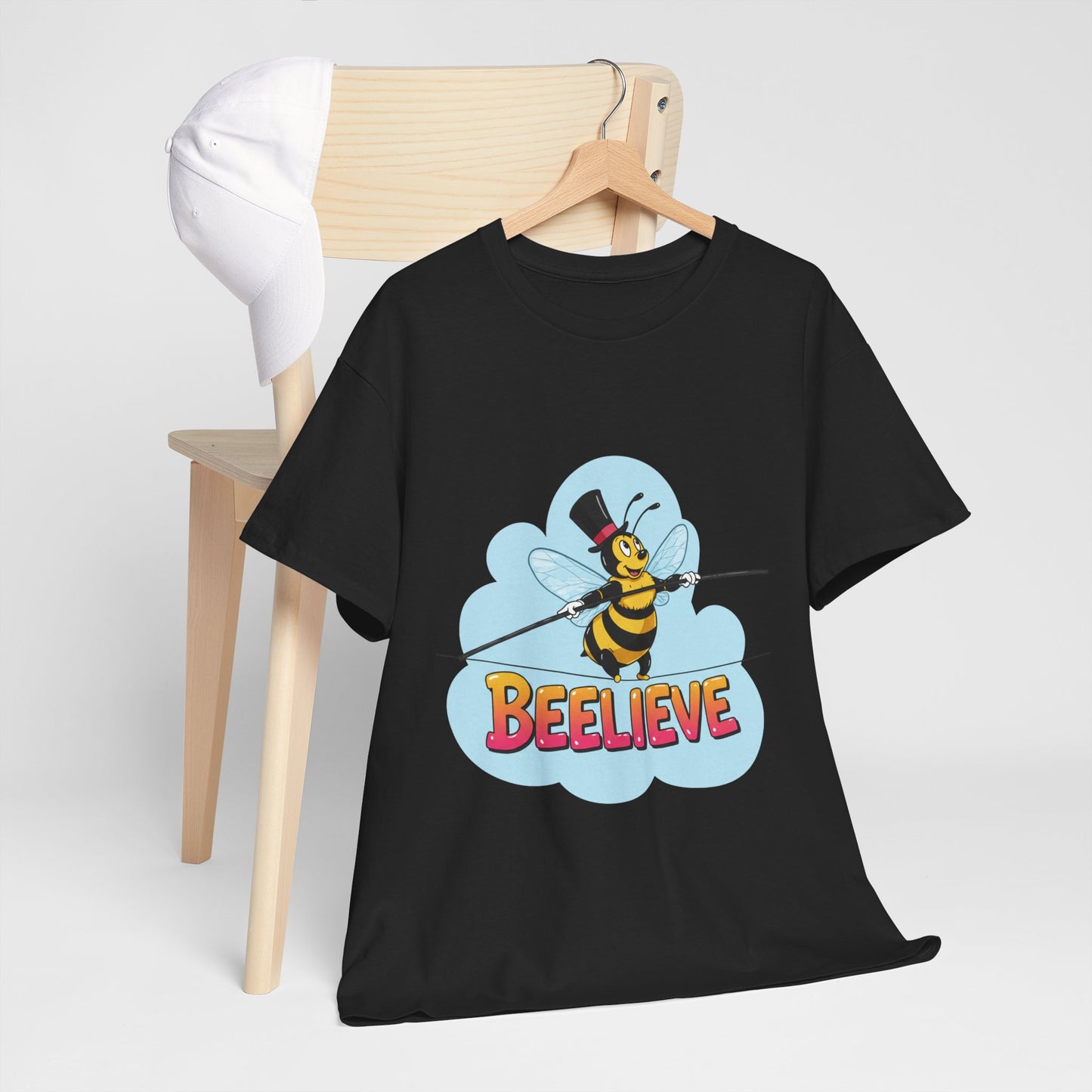 “Beelieve” Bee Pun T‑Shirt | Cute Bee Graphic Tee | Inspirational Pun Shirt | Funny Nature Lover Gift | Bee Belief Positive Vibes Tee
