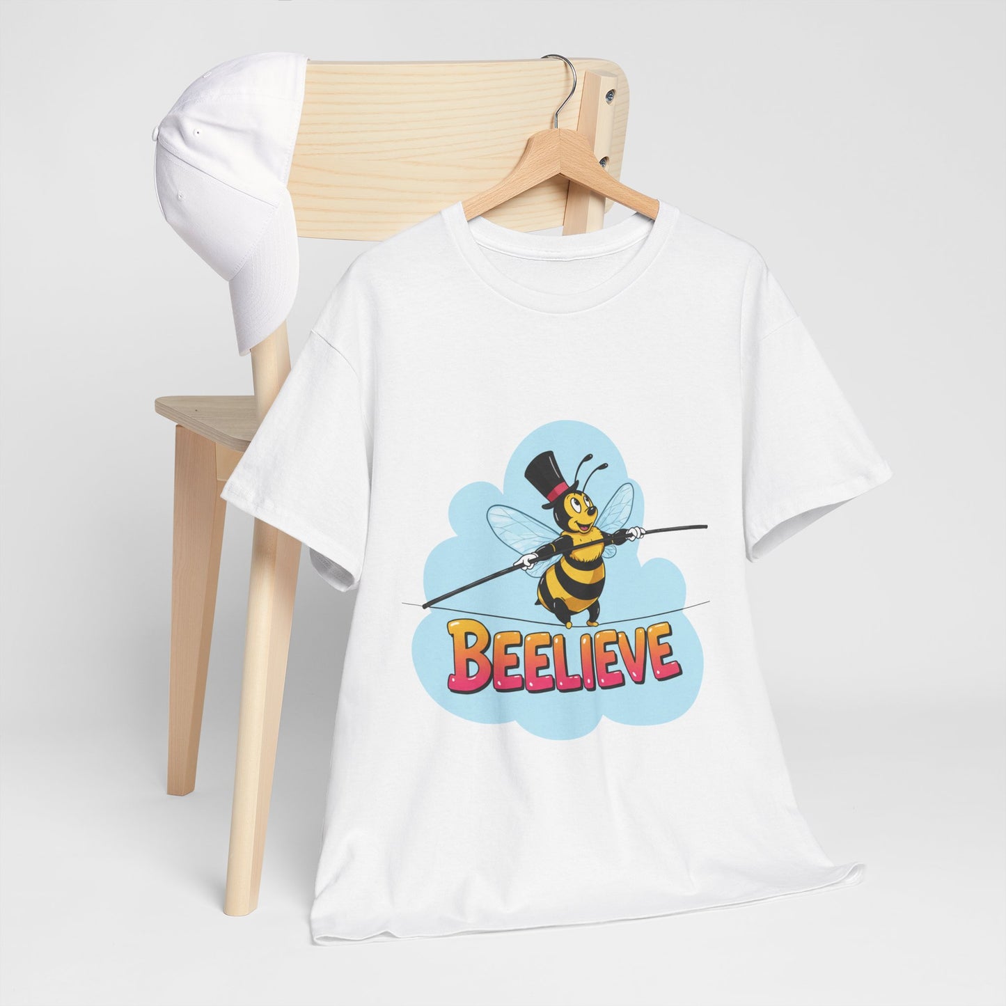 “Beelieve” Bee Pun T‑Shirt | Cute Bee Graphic Tee | Inspirational Pun Shirt | Funny Nature Lover Gift | Bee Belief Positive Vibes Tee