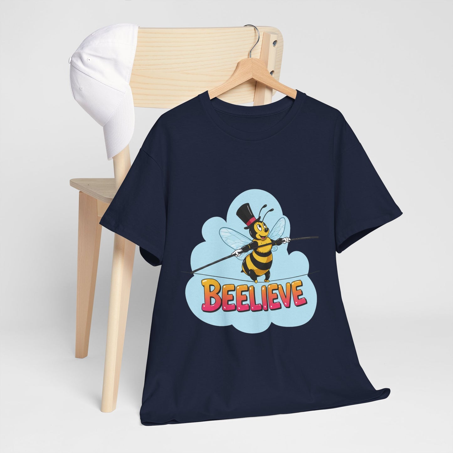 “Beelieve” Bee Pun T‑Shirt | Cute Bee Graphic Tee | Inspirational Pun Shirt | Funny Nature Lover Gift | Bee Belief Positive Vibes Tee